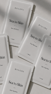 BYUORE Sea to Skin sachets arranged on ivory